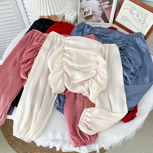 Modern női blúz csónakos nyakkivágással, több színben