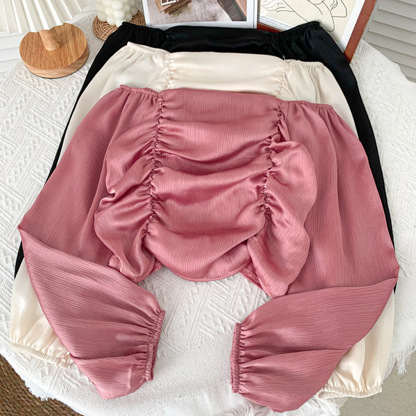 Modern női blúz csónakos nyakkivágással, több színben