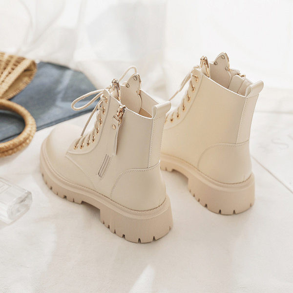 Női csizma fűzős és cipzáros brit stílusú