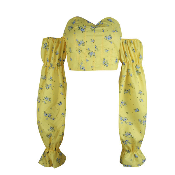 Naiste pikkade varrukatega ja lillemotiividega pluus