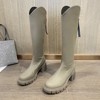 Modern női csizma sima modell cipzárral