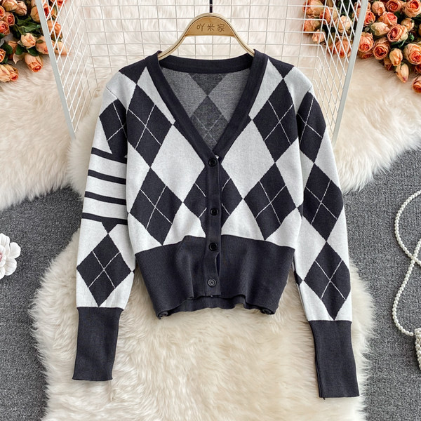 Női alkalmi mellény spitz nyakkivágással és fekete gombokkal