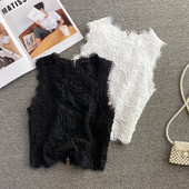 Modern női felső, hímzéssel és cipzárral a hátán