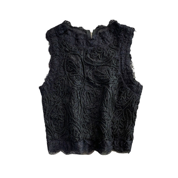 Modern női felső, hímzéssel és cipzárral a hátán