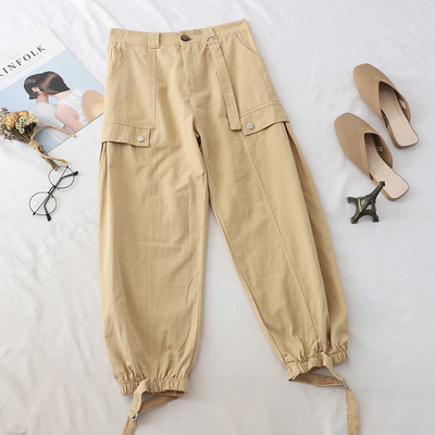 Alkalmi nadrág gumírozással és zsebekkel