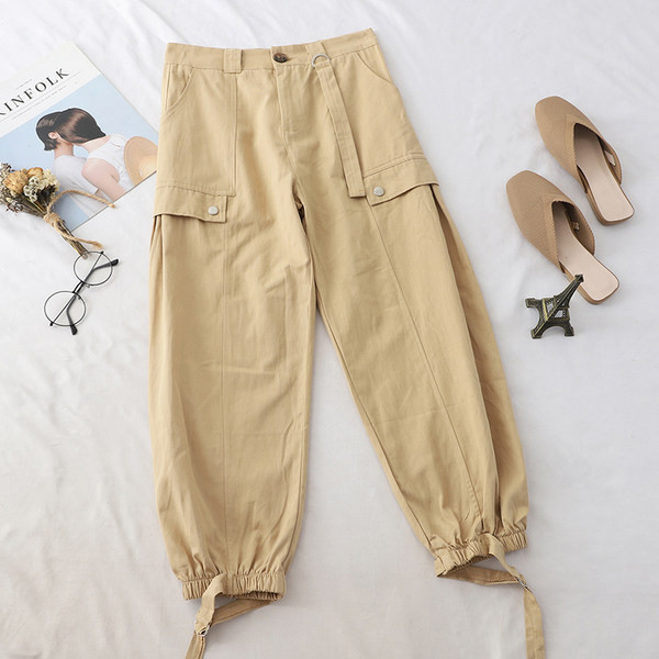 Alkalmi nadrág gumírozással és zsebekkel