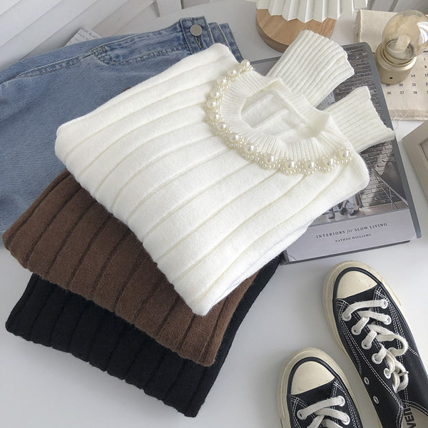 Női pulóver gyöngypánttal