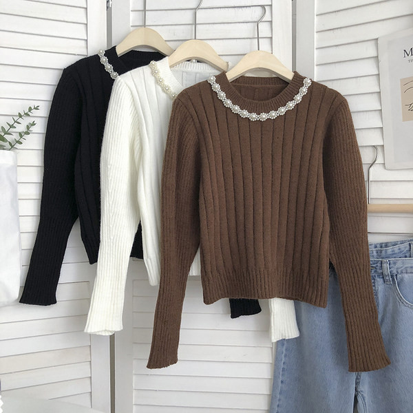 Női pulóver gyöngypánttal