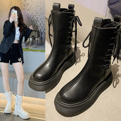 Kunstnahast naiste saapad küljesidemetega