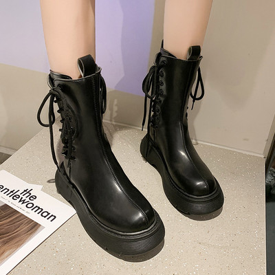 Kunstnahast naiste saapad küljesidemetega