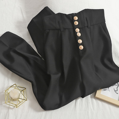 Modern női nadrág gombokkal, magas derékkal