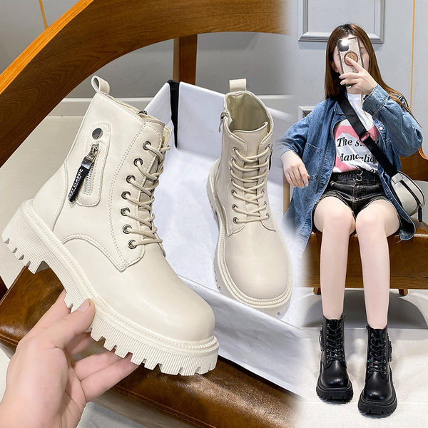 Alkalmi női csizma cipzárral és durva talppal