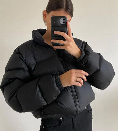 Moodne naiste lühike jope luku ja taskutega