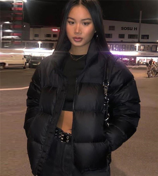 Moodne naiste lühike jope luku ja taskutega