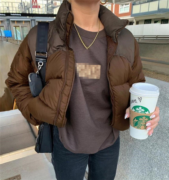 Moodne naiste lühike jope luku ja taskutega