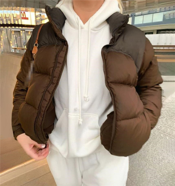 Moodne naiste lühike jope luku ja taskutega