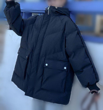 Modern női hosszú modell kabát zsebekkel és gombokkal