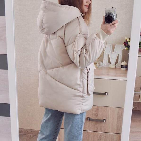 Modern női hosszú modell kabát zsebekkel és gombokkal