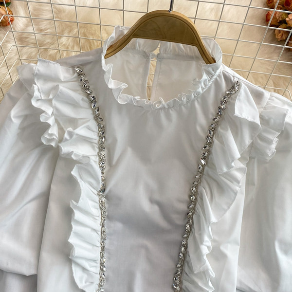 Kahes värvitoonis lokkide ja kivikestega naiste särk