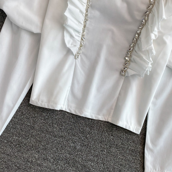 Kahes värvitoonis lokkide ja kivikestega naiste särk