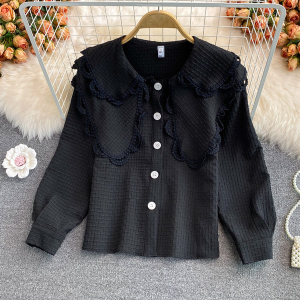 Naiste nööpide ja tikanditega särk