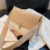 Női táska fém rögzítéssel, hosszú lánccal