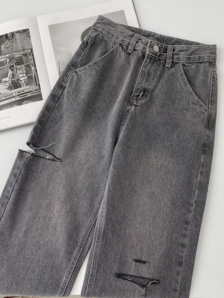 Széles farmer szakadt motívumokkal, magas derékkal