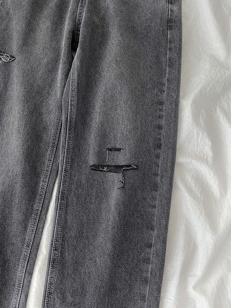 Széles farmer szakadt motívumokkal, magas derékkal