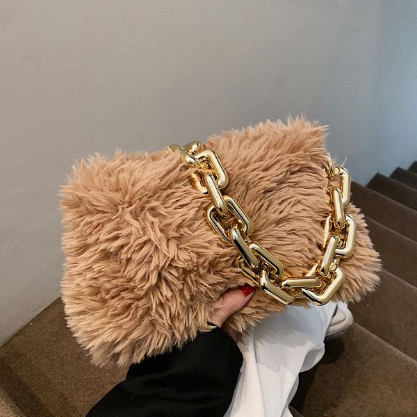 Naiste metallist käepidemega sulukott