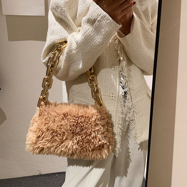 Naiste metallist käepidemega sulukott