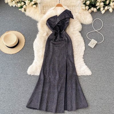 Stilinga moteriška ilga suknelė su vienu dirželiu