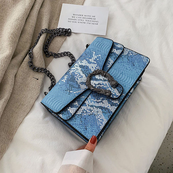 Geantă pătrată de damă cu imprimeu animal și element metalic