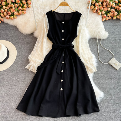 Γυναικείο μοντέρνο φόρεμα με κουμπιά και ζώνη σε μαύρο χρώμα