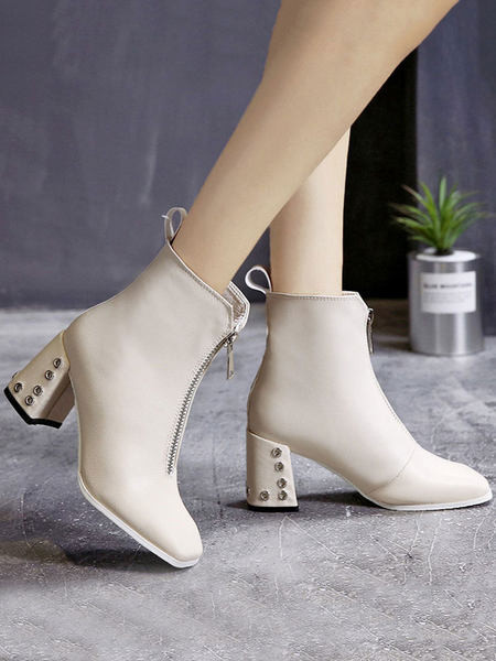 Γυναικείες μπότες με φερμουάρ και μεταλλικά στοιχεία τακουνιού