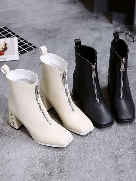 Γυναικείες μπότες με φερμουάρ και μεταλλικά στοιχεία τακουνιού