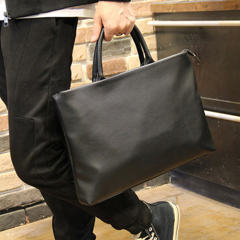 Κομψή ανδρική τσάντα απλό μοντέλο με κοντή λαβή