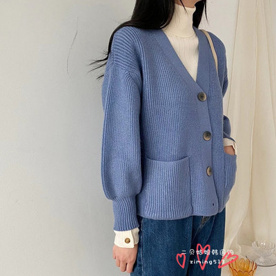 Γυναικεία πλεκτή ζακέτα  με κουμπιά και τσέπες