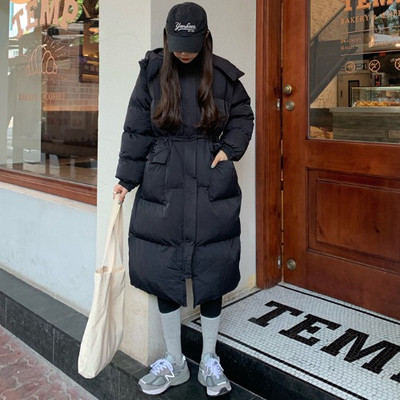 Μακρύ γυναικείο μπουφάν με επένδυση με μεγάλες τσέπες και κουκούλα