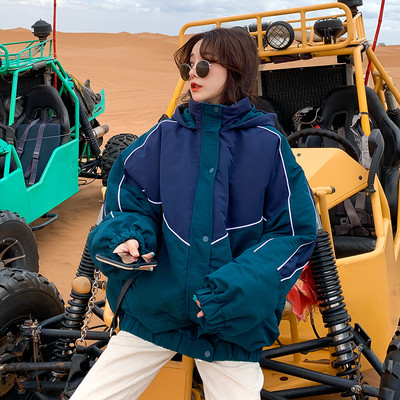 Ženska casual jakna s kapuljačom - široki model