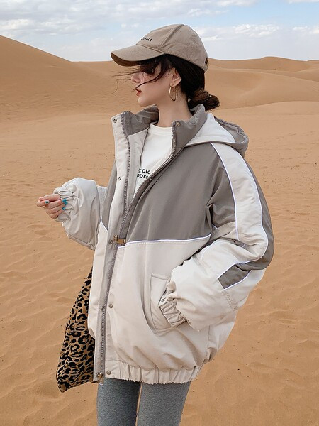 Ženska casual jakna s kapuljačom - široki model