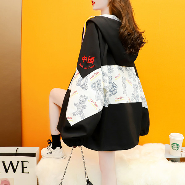 Široka ženska jakna s kapuljačom i vezicama