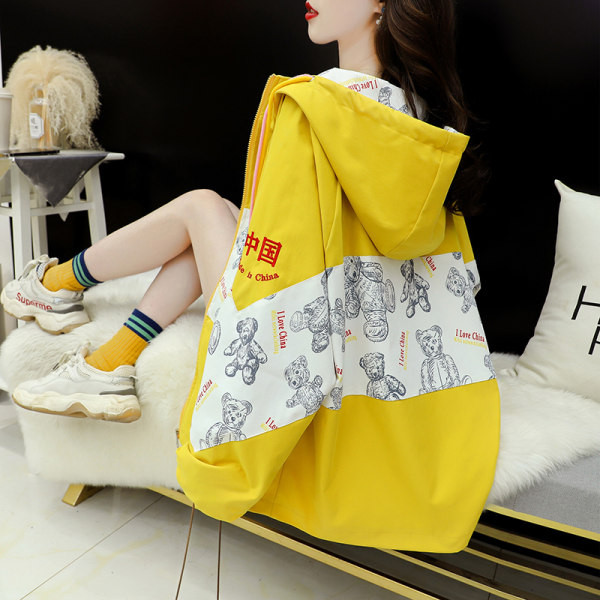 Široka ženska jakna s kapuljačom i vezicama