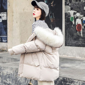 Γυναικείο μπουφάν φαρδύ μοντέλο με γούνα στην κουκούλα