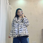 Γυναικείο μπουφάν φαρδύ μοντέλο σε λευκό και μαύρο χρώμα