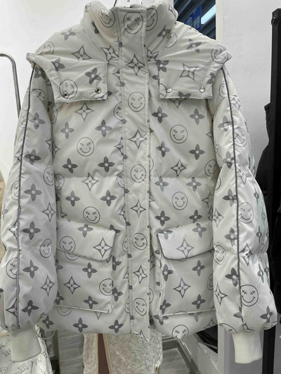 Κομψό γυναικείο χειμερινό μπουφάν με κουκούλα και τσέπες