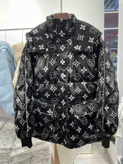 Κομψό γυναικείο χειμερινό μπουφάν με κουκούλα και τσέπες