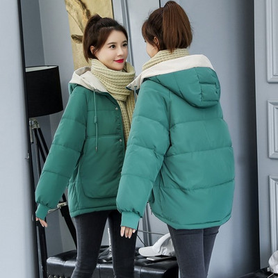 Φαρδύ μοντέρνο χειμερινό γυναικείο μπουφάν με μεγάλες τσέπες και ελαστικά μανίκια