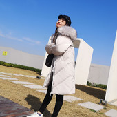 Μακρύ γυναικείο χειμωνιάτικο μπουφάν με κουκούλα