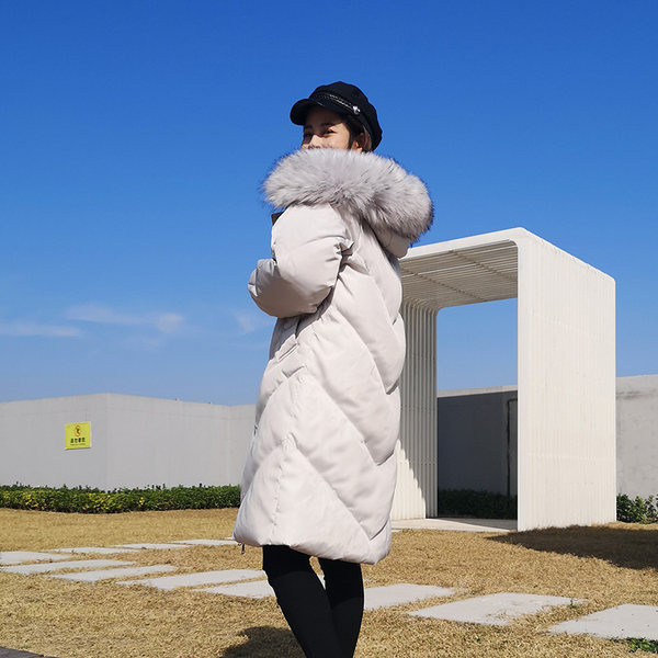 Μακρύ γυναικείο χειμωνιάτικο μπουφάν με κουκούλα 