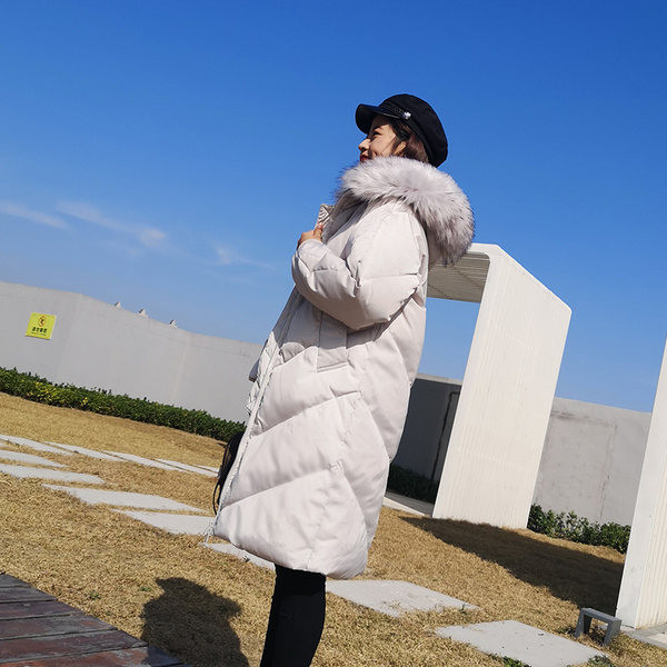 Μακρύ γυναικείο χειμωνιάτικο μπουφάν με κουκούλα 